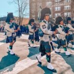 Bag pipers at Morris County St. Patricks's Day walking down South Street in Morristown.