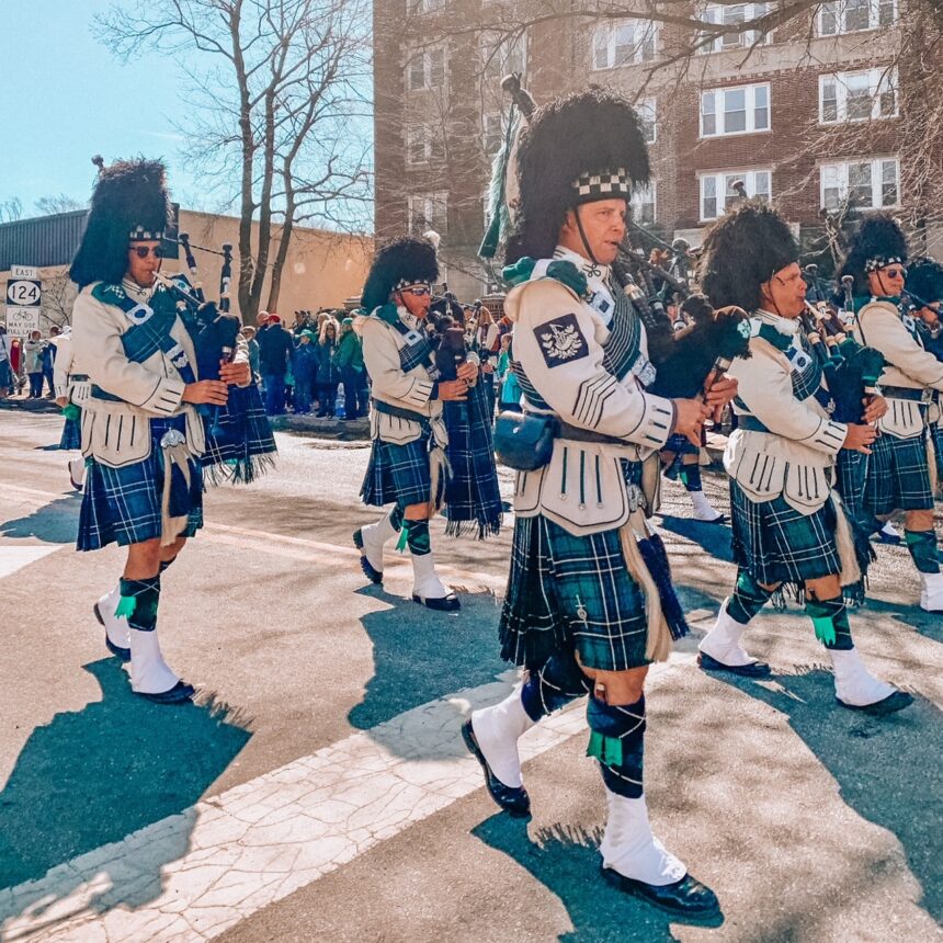 Bag pipers at Morris County St. Patricks's Day walking down South Street in Morristown.